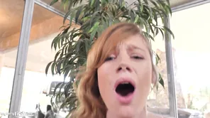 A red haired beauty with big natural boobs does her first blowjob