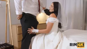 Leanne Lace, a married European brunette, enjoys solo analingus in her bedroom.