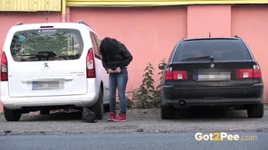 A beautiful dark haired woman urinates outdoors in this homemade video showcasing her wild side